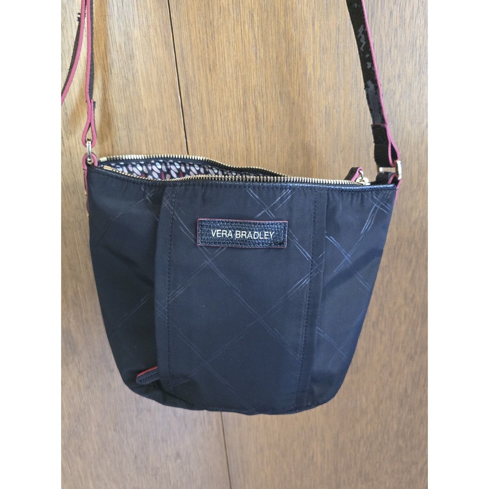 Vera Bradley purse, black w/red trim zipper, shoulder strap. 8X11. B340
